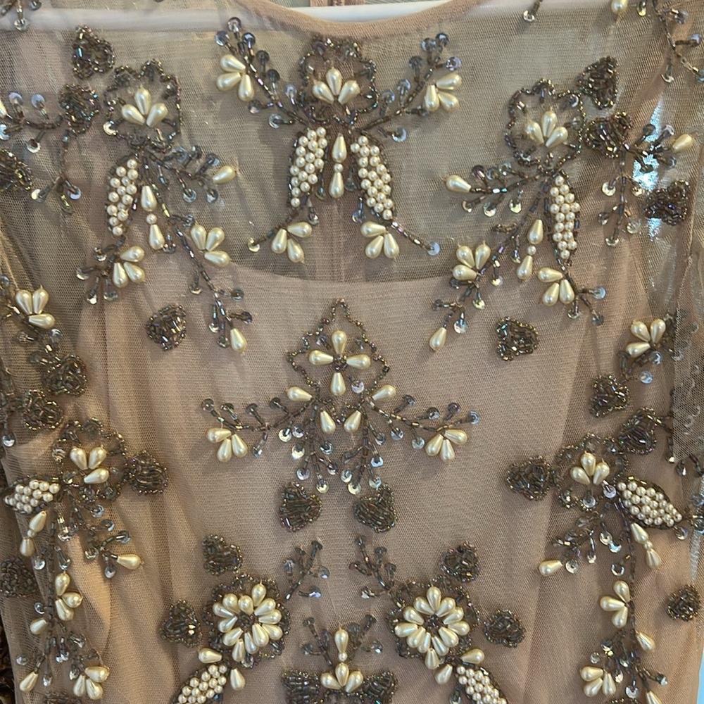 Blush color, heavily beaded feminine dress